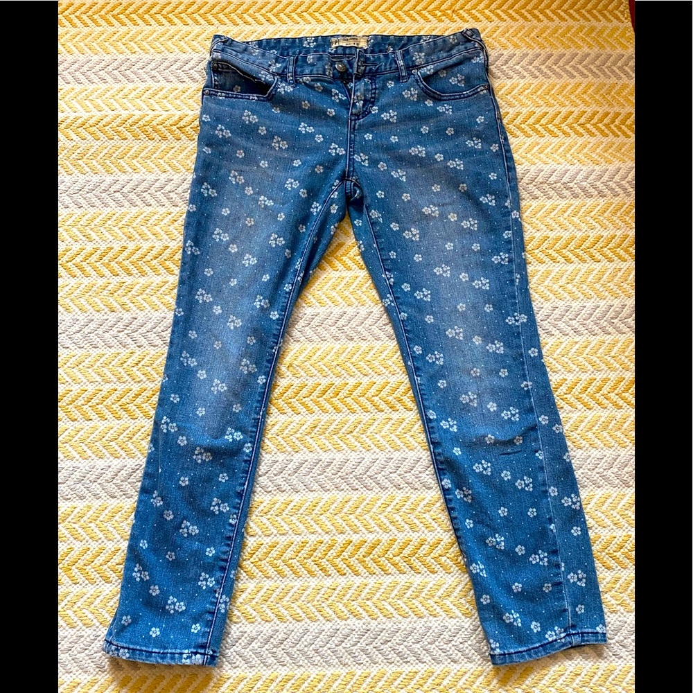 Free People floral print ankle jeans.